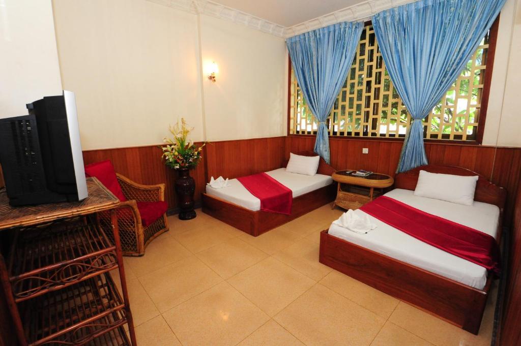 Okay Guesthouse Phnom Penh Rum bild